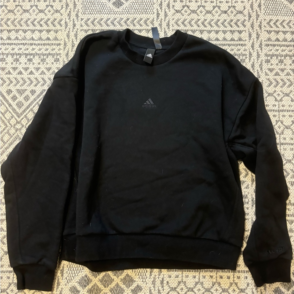 Women’s black adidas crewneck pullover
